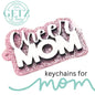 A pink glittery keychain with the words Cheer MOM in white letters. The bottom left features a green circular logo with GETZ it done and Aledo, Texas. The text keychains for mom is written in black and green below the keychain.