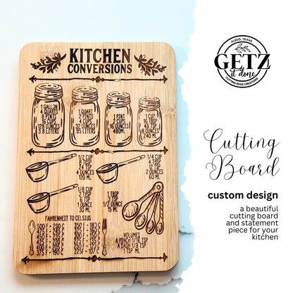 A wooden cutting board displays kitchen conversions with illustrations of jars and measuring spoons. It includes conversions for gallons, quarts, pints, cups, tablespoons, teaspoons, Fahrenheit to Celsius, and volumes. To the right, Cutting Board, custom design text is visible.