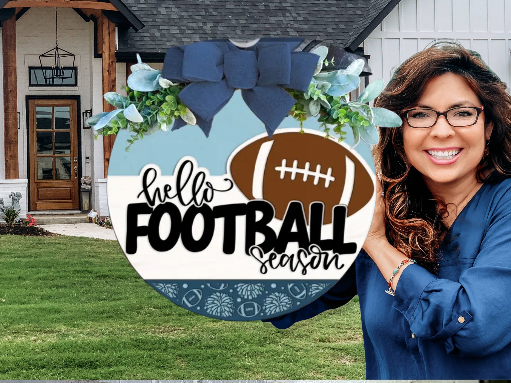 A smiling woman with glasses holds a round sign decorated with a bow, flowers, and a football, reading “hello FOOTBALL season,” standing in front of a modern house with a green lawn.