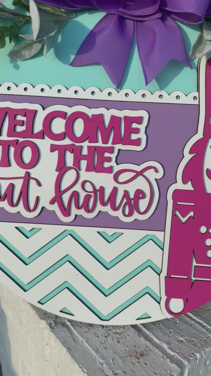 Welcome to the Nut House Door Sign – Nutcracker Christmas Wreath, 3D Layered Wooden Holiday Door Hanger with Purple Bow (16–20”)