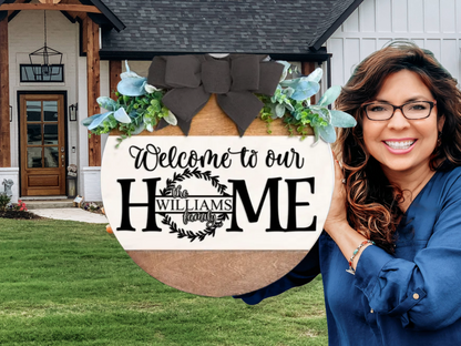 Personalized Welcome to Our Home Sign – Custom Family Name Door Hanger, Farmhouse Layered Wood Home Decor with Bow and Greenery
